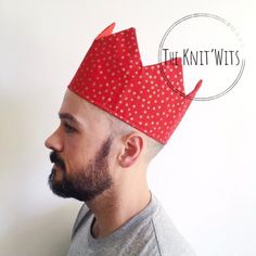 a man with a red crown on his head