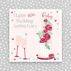 a happy wedding anniversary card with two champagne flutes and roses on it, says happy 40th wedding anniversary ruby