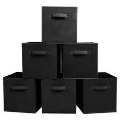 six black storage bins stacked on top of each other