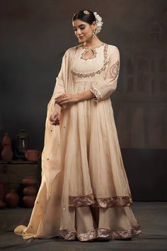 Beige chanderi kalidar kurta with floral thread work and sequins embroidery on the neckline and sleeves. Comes with metallic bordered sharara and organza dupatta. - Aza Fashions Kundan Anarkali Set With Straight Kurta For Wedding, Anarkali Style Kundan Kurta For Wedding, Traditional Chinon Anarkali Set For Reception, Transitional Anarkali Sets With Dori Work, Anarkali Chanderi Set With Cutdana Details, Anarkali Chanderi Set With Cutdana, Anarkali Set With Cutdana In Chanderi, Reception Chinon Kurta With Cutdana, Wedding Straight Kurta Choli In Raw Silk