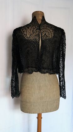 "Antique Lace Blouse - Jacket This is a treasure perfect for your closet. Works like blouse or jacket and close with small pin. In good condition! Some lining Silk in black Measurements: - Shoulder to shoulder: 15.74\" (40 cm) - Slevees: 23.62\" (60 cm) - Chest; 39.37\" (100 cm) Thanks for stopping by!!" Elegant Cropped Evening Tops, Elegant Cropped Tops For Evening, Elegant Cropped Blouse For Party, Black Cropped Party Outerwear, Black Cropped Outerwear For Party, Black Long Sleeve Outerwear For Wedding, Formal Cropped Blouse For Fall, Black Long Sleeve Blouse For Wedding, Black Long Sleeve Wedding Outerwear