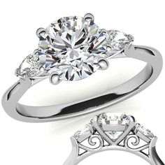 an engagement ring with three stones on the side