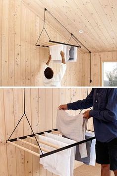 two pictures of a person hanging clothes in a room with wood paneled walls and ceiling