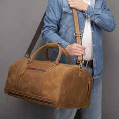 "Handmade Full Grain Leather Duffle Bag with shoe Compartment Personalized Large Weekend Bag Vacation Holidays Travel Bag Weekender Luggage Bag Best Men Gift Groomsmen Gift Christmas Gift Father's Gift Anniversary Gift Unique Gift for Men Wedding Gift --------------------------------- Please offer your phone number in order to deliver your orders successfully. --------------------------------- Description: -Full Grain Leather and Brass Hardware -Length: 52cm (L) x 31cm (W) x 26cm(H) / 20.5\"(L) Canvas Duffel Bag, Personalized Travel Bag, Wedding Gifts For Men, Large Travel Bag, Vintage Crossbody Bag, Leather Duffel Bag, Leather Duffel, Leather Weekender Bag, Oversized Bag