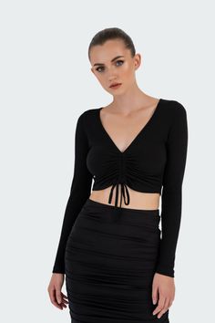 Ruched-Front Top Ruched Stretch Crop Top For Fall, Stretch Ruched Crop Top For Fall, Fall Stretch Ruched Crop Top, Trendy Long Sleeve Ruched Crop Top, Chic Ruched Crop Top For Fall, Trendy Ruched V-neck Crop Top, Spring V-neck Ruched Crop Top, Spring Ruched V-neck Crop Top, Ruched V-neck Crop Top For Spring