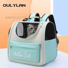 a blue and white backpack with a cat peeking out the front window that says hello cat