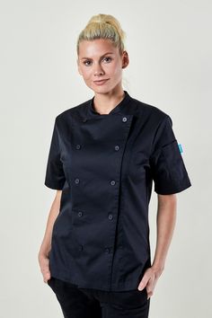 "Showcase your talent in the kitchen with a coat that has your back. The Avery Women's Chef Coat is among top chef gear for female chefs - and for good reason. Crafted with high-quality poly-cotton, that keeps you cool and princess lines, it creates a flattering, tailored fit for a mood-lifting effect. Meanwhile, short sleeves, side vents, and moisture-wicking underarm vents allow you to do your best work with complete range of motion and peace of mind. Available in black and white. The Avery Women's Chef Coat is part of BlueCut Essentials, an affordable collection of high-quality aprons and uniform staples designed to provide optimal utility and a sleek, classic style for confidence on and off duty. **Product Features** 76/21/3 Poly/Cotton/Spandex Fine Twill - 6 oz Moisture Wicking Undera Black Chef, Chef Shirt, Chef Jackets, Chef Shirts, Female Chef, Princess Line, Chef Coat, Top Chef, Do Your Best