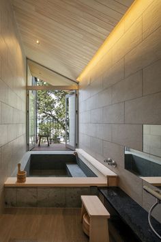 an indoor jacuzzi tub in the middle of a room