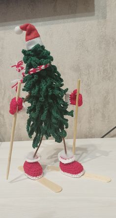 a small christmas tree with skis on it