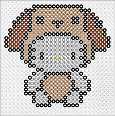 a cross stitch pattern with an image of a man's face in the center