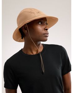 A light, breathable, packable wide-brim hat for hikes and adventures in the sun. Lightweight Curved Brim Bucket Hat For Outdoor, Lightweight Outdoor Bucket Hat With Curved Brim, Upf 50+ Bucket Hat With Short Brim For Hiking, Upf 50+ Short Brim Bucket Hat For Hiking, Packable Curved Brim Bucket Hat For Outdoor, Lightweight Packable Wide Brim Bucket Hat, Lightweight Brimmed Hats For Hiking, Lightweight Wide Brim Packable Bucket Hat, Lightweight Wide Brim Hat For Hiking