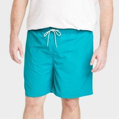 Be ready for warm summer days by the water with these Swim Trunks from Goodfellow & Co™. These men’s swim trunks feature a solid hue and above-the-knee length for the perfect waterside look. A front drawstring with an adjustable waist helps you find the perfect fit every time you wear them, while UPF 50+ sun protection helps ward off harmful sun rays. Whether you’re hanging out on the shore or by the pool, these men’s swim trunks are perfect for all your waterside adventures. 100% Satisfaction G Printed Swim, Sun Rays, Swim Suit Bottoms, Mens Big And Tall, Boxer Briefs, Big & Tall, Swim Trunks, Above The Knee, Aqua Blue