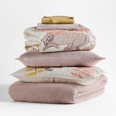 four pillows stacked on top of each other