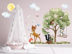 a child's room with wall decals and animals on the tree, in front of a teepee tent