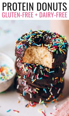 two chocolate donuts with sprinkles on top and the words gluten - free dairy - free