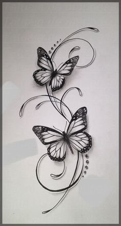 two butterflies with swirls and dots on white paper