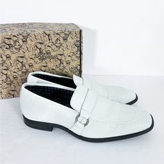 These Are A Pair Of Karl Lagerfeld Men's Slip On Loafers In Size 11 M. The Box Says Light Gray But The Shoes Looks White To Me. There Is A Strap With Silver Hardware Details. These Shoes Are Very Cute And Look Comfortable Too. These Are New With A Box. White Pointed Toe Leather Shoes For Semi-formal Occasions, White Leather Dress Shoes For Semi-formal Occasions, White Leather Dress Shoes For Semi-formal Events, White Loafers With Textured Sole And Plain Toe, White Loafers With Textured Sole, White Plain Toe Loafers With Textured Sole, White Plain Toe Office Dress Shoes, White Pointed Toe Dress Shoes For Formal Occasions, Formal White Pointed Toe Dress Shoes