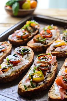 several slices of bread with different toppings on them