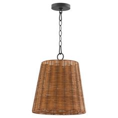 a light hanging from a ceiling fixture with a rattan shade on the top and bottom