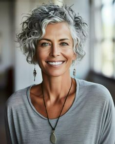 The Best Haircuts and Youthful Hairstyles for Women Over 50 - Fabulous Ever After Short Curly Haircuts Grey Hair, Curly Short Grey Hair Over 50, Curly Bob Grey Hair, Grey Curly Short Hair, Gray Short Curly Hair Over 50, Salt And Pepper Hairstyles For Women, Older Women Wavy Hairstyles, Short Grey Wavy Hair, Edgy Haircuts For Curly Hair