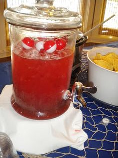 a jar filled with liquid sitting on top of a table