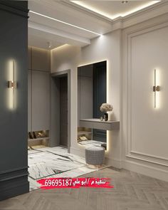 the interior of a modern bathroom with marble flooring and walls, along with lights