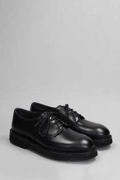 Lace up shoes in black leather, laces, round toe, rubber sole, 100% leather, Made in Italy Black Lace-up Shoes With Textured Sole, Classic Leather Lace-up Shoes With Vibram Sole, Black Lace-up Shoes With Vibram Sole, Black Leather Loafers For Derby, Black Calf Leather Oxfords With Stitched Sole, Black Oxfords With Stitched Sole For Office, Black Lace-up Shoes With Contrast Sole For Work, Black Oxfords With Textured Sole For Derby, Black Oxfords With Rubber Sole For Derby