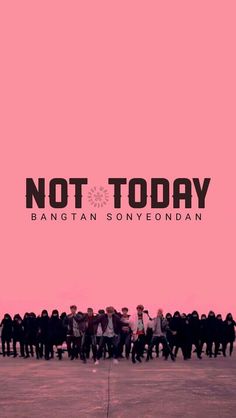 a group of people standing in front of a pink wall with the words not today written on it