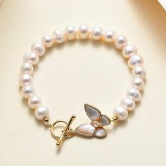 Perfect Classy And Elegant Pearl Bracelet. Ideal For Gifting To Someone You Love 6.89inch Chain Elegant Jewelry Bracelet With Butterfly Clasp, Elegant Bracelet With Butterfly Clasp, Elegant Bracelets With Butterfly Clasp, Butterfly Clasp Bracelets For Gift, Elegant Adjustable Bracelet With Butterfly Clasp, Elegant Wedding Jewelry With Butterfly Clasp, Elegant Silver Bracelet With Butterfly Clasp, Elegant Gold Bracelets With Butterfly Clasp, Elegant Gold Bracelet With Butterfly Clasp