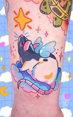 a person with a tattoo on their leg that has an image of a cartoon character