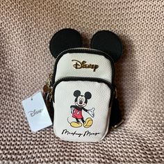 Disney Mickey Mouse Primark Crossbody Phone Bag Mickey Mouse Backpack For Daily Use, White Mickey Mouse Bag For Disney Fan Events, Disney White Travel Shoulder Bag, Disney Style White Shoulder Travel Bag, Disney Crossbody Bags For Disney Trips, Disney Style Crossbody Bags For Disney Trips, Disney Mickey Mouse Bags For Disney Trips, Disney Mickey Mouse Bags For Disney Fan Events, Cute White Mickey Mouse Bags