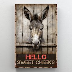 a donkey with the words hello sweet cheeks on it's face