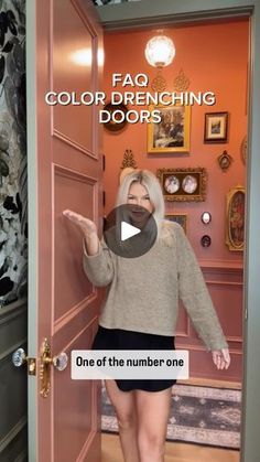 a woman standing in front of a door with the words faq color drenching doors