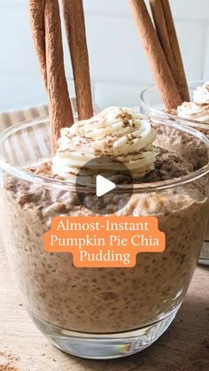 two bowls filled with pudding and cinnamon sticks on top of a wooden table next to an orange sign that says almost instant pumpkin pie cha pudding