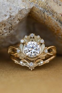 a close up of a ring on a rock