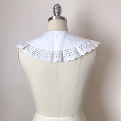 A handmade collar created from embroidered vintage textiles and trim. It has a beautiful cutwork design on cotton fabric. It fastens with a hook and eye. One size. White Detachable Fitted Collar, White Fitted Detachable Collar, Classic White Fitted Collars, White Fitted Peter Pan Collar, White Lace Collar For Spring, White Lace Peter Pan Collar, The Good Witch, Hook And Eye, A Hook