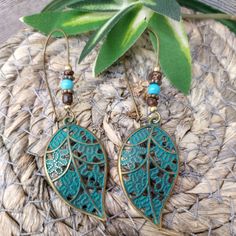 These Women's Earrings Are An Excellent Addition To Any Jewelry Collection. The Bronze Metal Gives Them A Unique And Stylish Look, With Beaded Detailing That Adds A Boho Vibe. The Earrings Feature A Leaf Shape In A Beautiful Blue Color, Making Them Great For Any Occasion. Perfect For Those Who Love Handcrafted And Artisan Jewelry, These Earrings Are A Must-Have For Fashion-Forward Women. They Are Perfect For Adding A Pop Of Color To Any Outfit, And The Dangle/Drop Style Makes Them A Great Choice Turquoise Metal Beaded Bohemian Earrings, Vintage Turquoise Earrings For Summer, Handmade Turquoise Casual Earrings, Turquoise Bohemian Beaded Earrings For Pierced Ears, Casual Turquoise Dangle Earrings, Bohemian Leaf-shaped Pierced Earrings, Bohemian Leaf-shaped Metal Earrings, Bohemian Turquoise Beaded Earrings For Gifts, Bohemian Turquoise Beaded Earrings As Gift