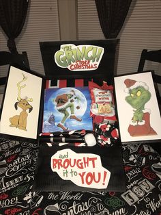 the grinch christmas card collection is on display in front of a table with greeting cards