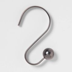 a metal hook with a ball on it