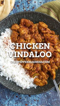 chicken vindaloo with white rice and pita bread in the background text reads chicken vindalo