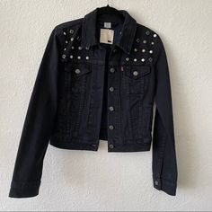 Levis Black Denim Jacket With Variety Of Studs. New Without Tags, No Flaws Or Missing Studs. Size Small Trendy Black Outerwear With Rivets, Fitted Black Denim Jacket For Fall, Spring Long Sleeve Denim Jacket With Rivets, Levi's Casual Black Denim Jacket, Edgy Denim Outerwear With Rivets, Edgy Denim Jacket With Rivets, Casual Fitted Outerwear With Rivets, Fitted Punk Denim Jacket For Fall, Fitted Casual Outerwear With Rivets