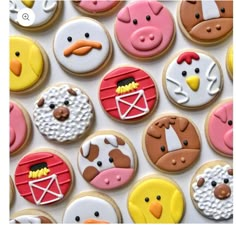 many decorated cookies with farm animals on them