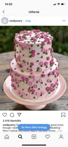 a three tiered cake with pink flowers on it