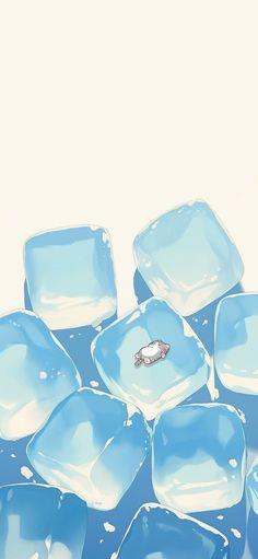 blue ice cubes with a tiny fish floating on them