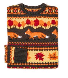 an orange and brown sweater with foxes on it