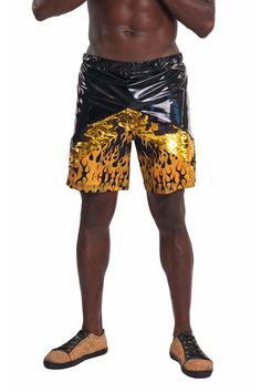 Everything you touch turns to gold ;) Our new Midas mens gold sequin rave shorts feature an elastic waistband, three panels one with metallic gold and black flip sequins, one in Blaze our holographic gold flame print spandex, and one in Aurora our holographic black spandex, as well as two side zipper pockets to ensure your stuff stays safe when you’re dancing and having fun. These ethically made mens festival shorts are perfect for raves and summer fun. SIZING: S/M - Fits 27in - 33in waist M/L - Holographic Black, Gold Sequin Shorts, Rave Shorts, Holographic Gold, Gold Shorts, Festival Shorts, Sequin Shorts, Rave Wear, Mens Gold