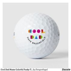 a white golf ball with the words cool dad on it