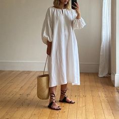 An Oversized Dress In Soft Silk Linen With A Drawstring Gathered V-Neckline And Ruched Detail On Dropped Shoulders. Brand Tag Coming Detached From One Side, This Is Easily Fixed. 50% Silk, 50% Linen Pit To Pit -- 25 Inches Length -- 45 Inches Waist -- 27 Inches Sleeve Length -- 26 Inches Sleeve Length Is Measured On The Long Side (Top) Of The Sleeve, From Sleeve Hem To Collar. The Original Owner Took In The Sides Of The Dress By 1.5" Total - This Is Factored Into The Stated Measurements. Wear Store, Silk Linen, Oversized Dress, Dress Store, Brand Tags, The Dress, Colorful Dresses, Women Wear, Midi Dress