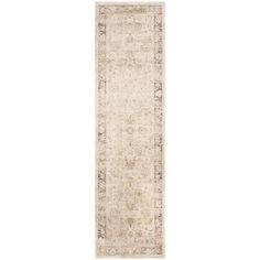 the runner rug is shown in beige and cream tones, with an intricate design on top