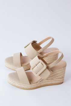 Elevate your style with the Brooke Raffia Wedge Sandal. The raffia wedge with a 3.5" heel adds a touch of playful sophistication. The adjustable buckle strap provides a secure fit and the suede straps and toe add a luxurious touch. Step into comfort and style with this unique sandal. General Info: Manmade Upper Manmade Outsole Raffia Wedge - 3.5" Heel Adjustable Buckle Strap Suede Straps and Toe Imported Mia Shoes, Heels & Wedges, Wedge Sandal, Clothing Company, Wedge Sandals, Wedges, Buckle, Sandals, Heels